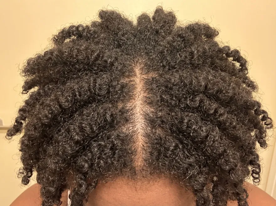 After 90 days — center part, coily hair