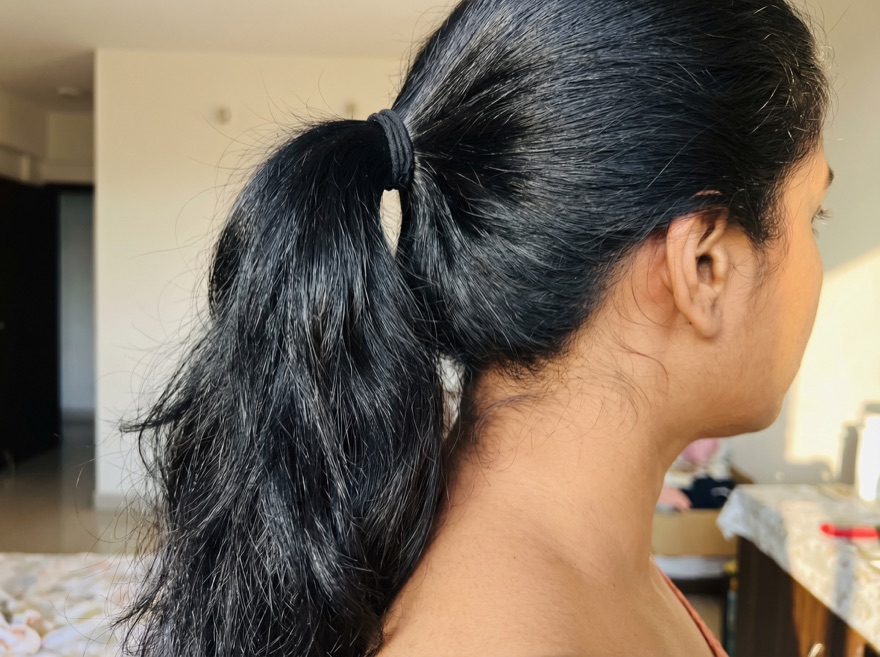 After 90 days — ponytail, straight black hair