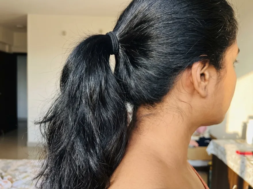 After 90 days — ponytail, straight black hair