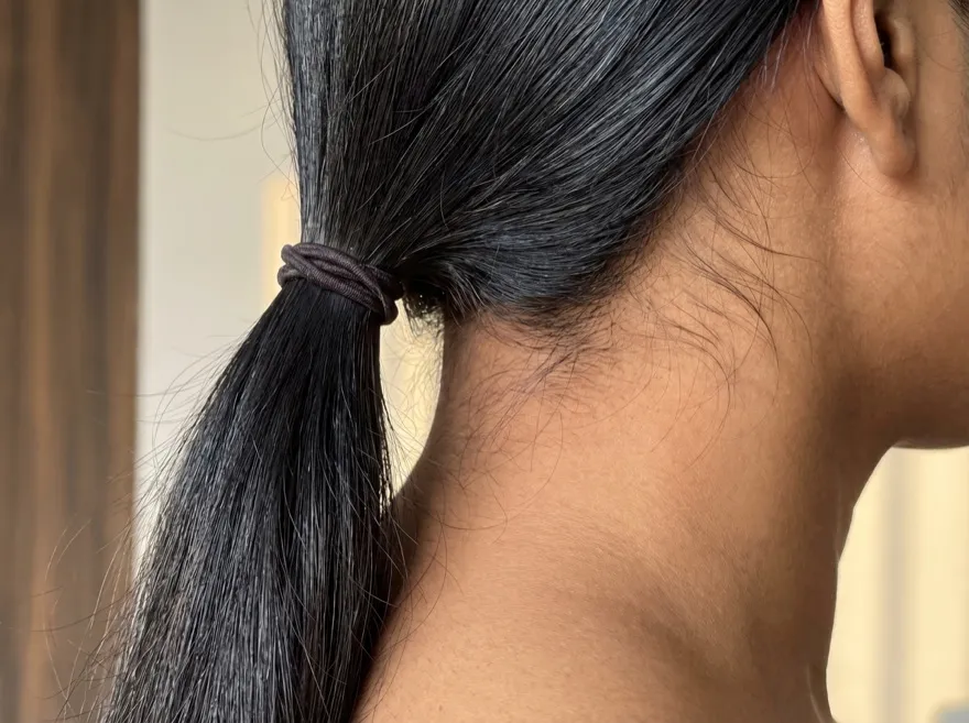 Before — ponytail, straight black hair